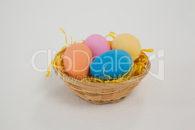 Painted easter eggs in basket