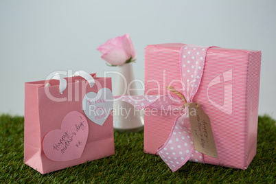 Pink gift bag, gift box with heart shape tag