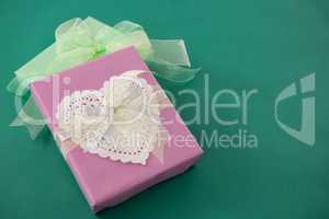 Gift boxes against green background