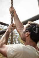 Military soldier training rope climbing