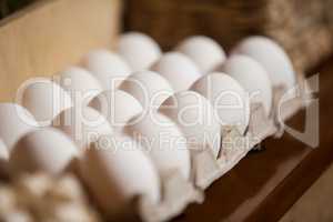 Close-up of eggs arranged in egg carton