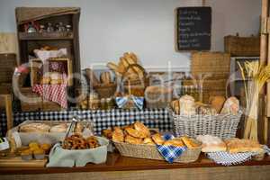 Various bread and cookies on counter