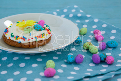 Cookie served with chocolates in a tray