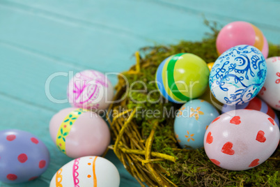 Painted Easter eggs in the nest
