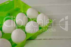 Close-up of Easter white eggs in the carton