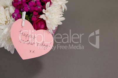 Bunch of fresh flowers with happy mothers day card