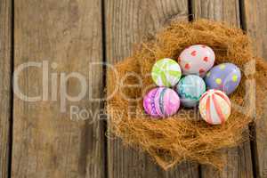 Painted Easter eggs in nest
