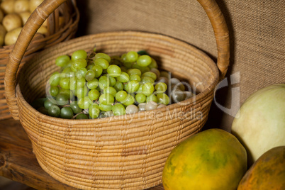 Close-up of fresh grapes in wicker basket