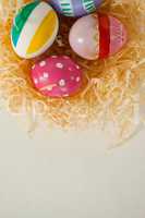 Painted easter eggs in nest