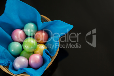 Colorful chocolate Easter eggs in napkin