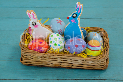 Various Easter eggs served in wicker basket
