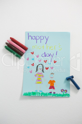 Happy mothers day greeting card with colored crayons