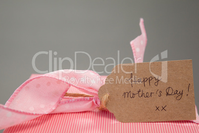 Close-up of gift box with happy mothers day card