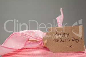 Close-up of gift box with happy mothers day card