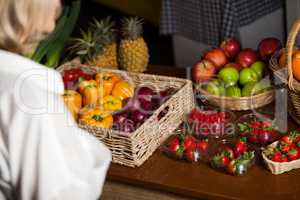Various types of fruits and vegetables at counter