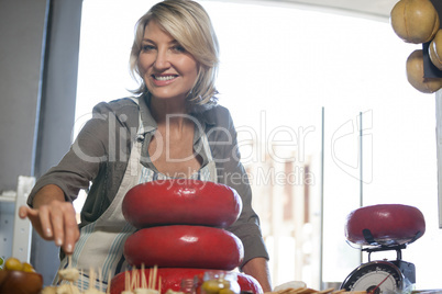 Portrait of female staff working at counter