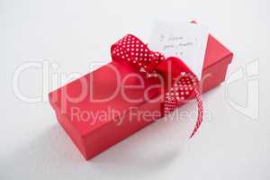 Gift box with I love u mom text on white background