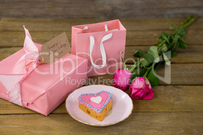 Gift box with roses and heart shape cookies