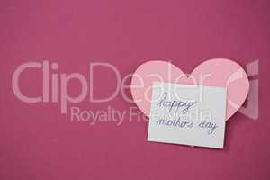 Happy mother day card with heart shape against pink background