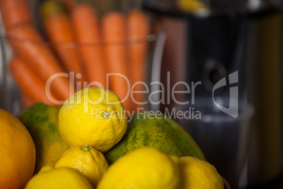 Close-up of lemon and papaya fruit
