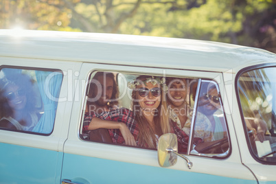 Group of friends travelling in campervan