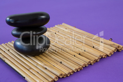 Zen stones on bamboo mat
