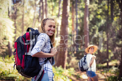 Beautiful woman walking in forest