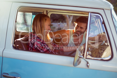 Couple travelling in campervan