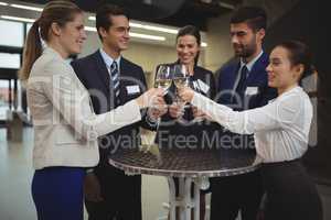 Businesspeople toasting glasses of champagne