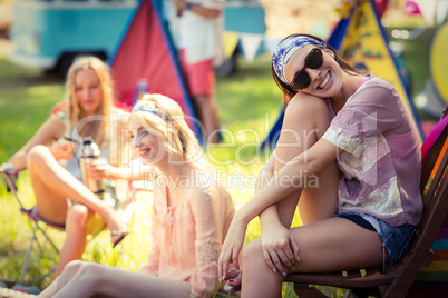 Group of friends having fun together at campsite