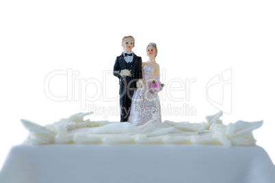 Wedding cake with couple figurines