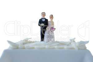 Wedding cake with couple figurines