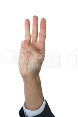 Businessman gesturing against background