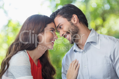 Couple smiling while looking at each other