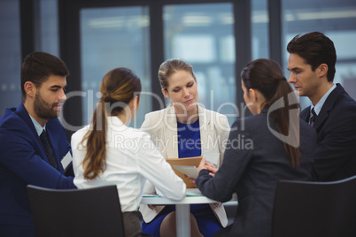 Businesspeople having a discussion in meeting