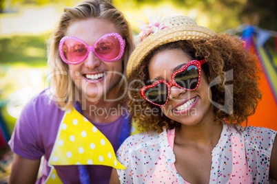 Friends smiling in park