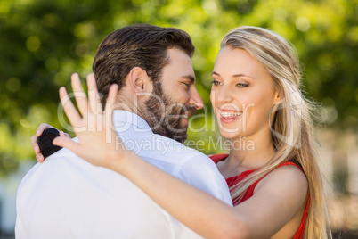 Beautiful woman looking at her ring Beautiful woman looking at her ring