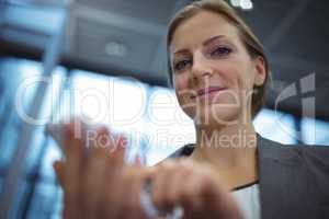 Businesswoman using mobile phone