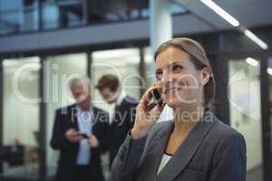 Businesswoman talking on mobile phone