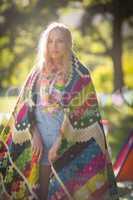 Woman wrapped in blanket