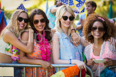 Group of friends standing together in park