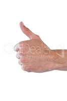 Hand showing thumbs up against white background