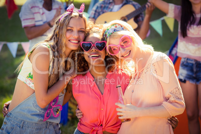 Group of friends having fun together at campsite