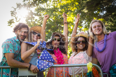 Group of friends standing together in park