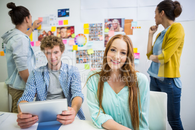 Portrait of smiling executive in office