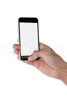 Hands holding a mobile phone against white background