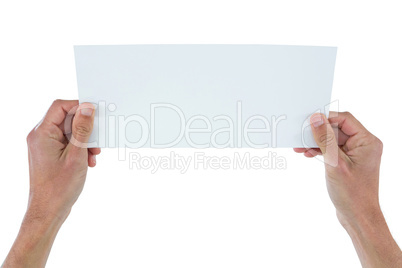 Business executive holding blank placard