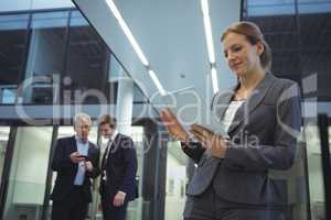 Businesswoman using digital tablet