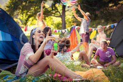 Woman having fun at campsite