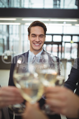 Businesspeople toasting glasses of champagne